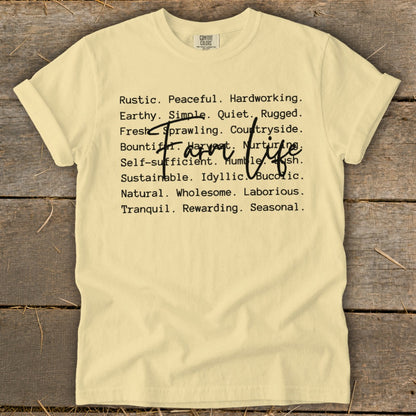 Light yellow t-shirt with "Farm life" and descriptive words in black text.