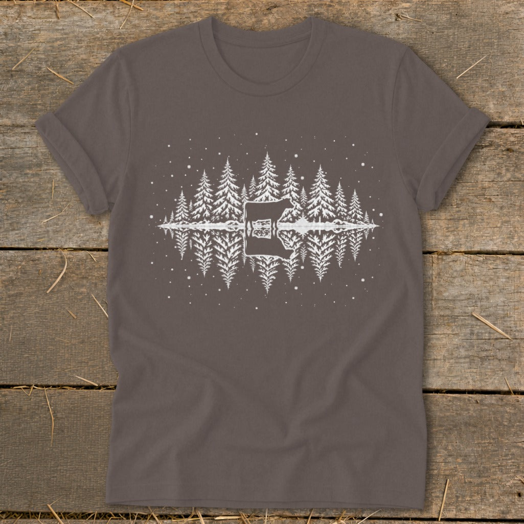 Brown t-shirt with white pine trees reflected in water and a guitar silhouette.