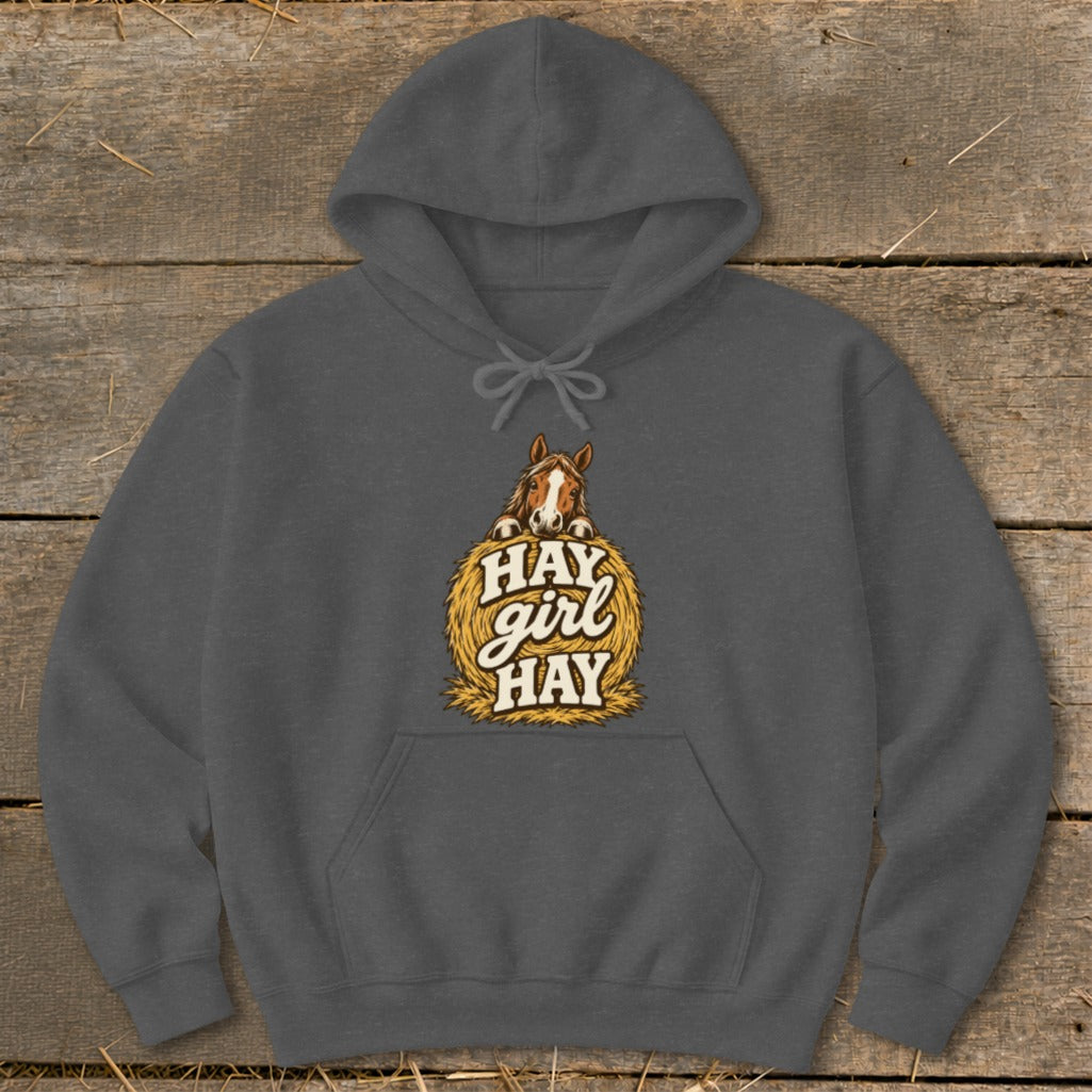 Dark grey hoodie with a horse peeking over a hay bale and text "HAY girl HAY".