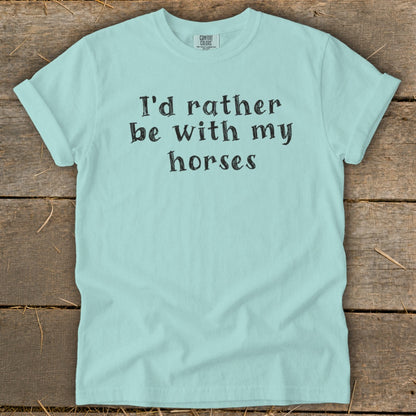 Light blue t-shirt with "I'd rather be with my horses" printed in black text.