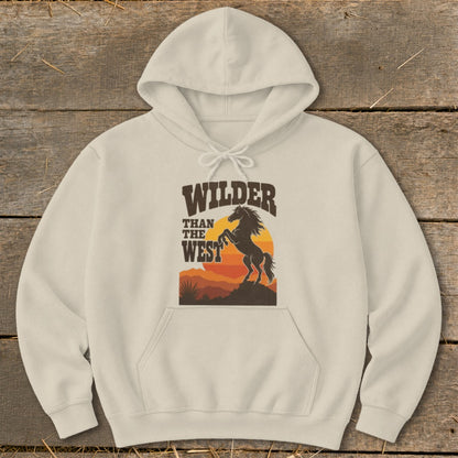 Cream hoodie with "Wilder Than The West" text and a silhouette of a rearing horse.