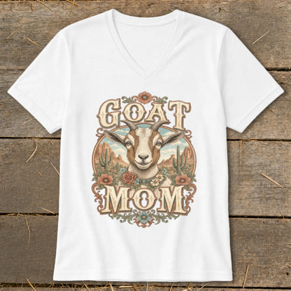 White t-shirt with a vintage-style graphic of a goat's head and the text "GOAT MOM".