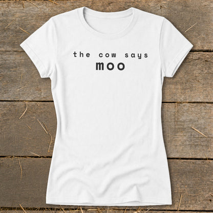 White t-shirt with black text "the cow says moo".