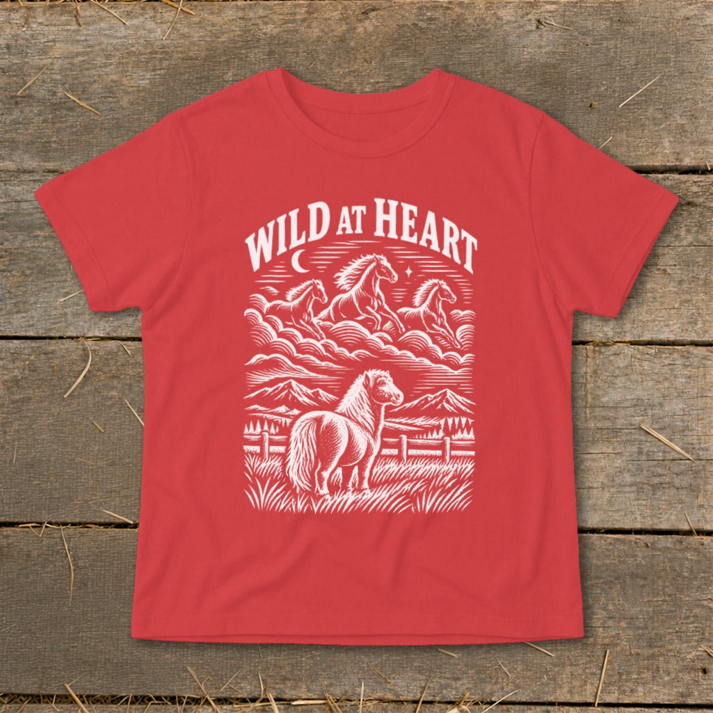 Red t-shirt with "Wild at Heart" text and horses in a mountainous landscape.