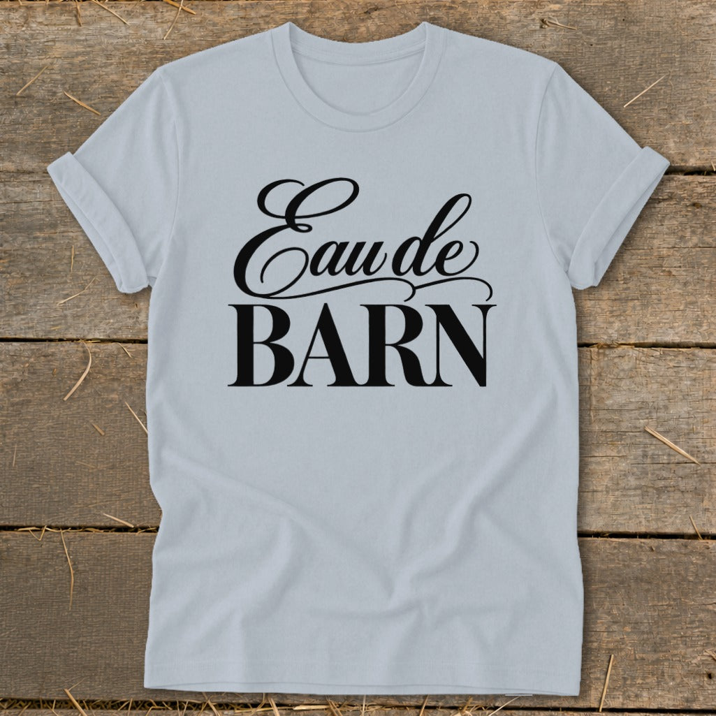 Light blue t-shirt with black text "Eau de BARN"