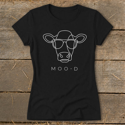 Black t-shirt with white line art of a cow wearing glasses and the text "MOO-D".