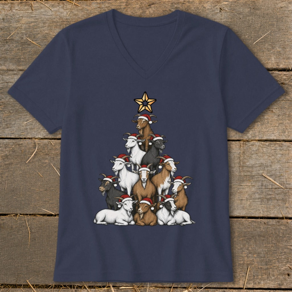 Goats in Santa hats form a Christmas tree topped with a star on a navy t-shirt.