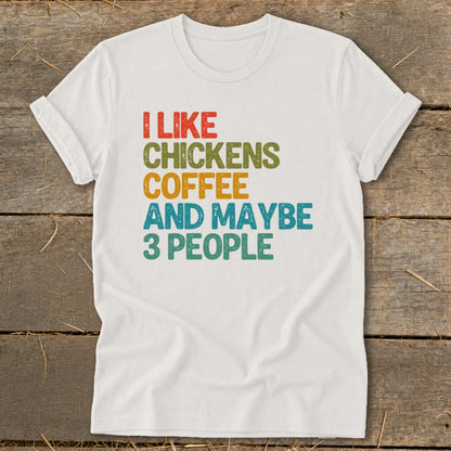 White t-shirt with text "I like chickens coffee and maybe 3 people".