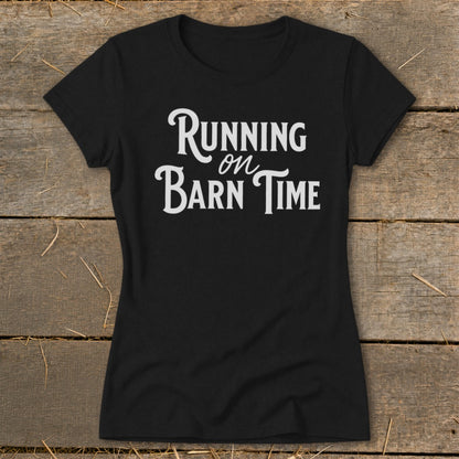Black t-shirt with white text that reads "Running on Barn Time".