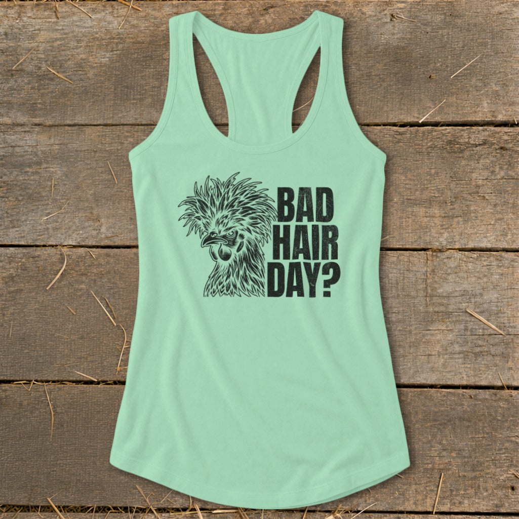 Mint green tank top with a black chicken graphic and text reading "BAD HAIR DAY?".