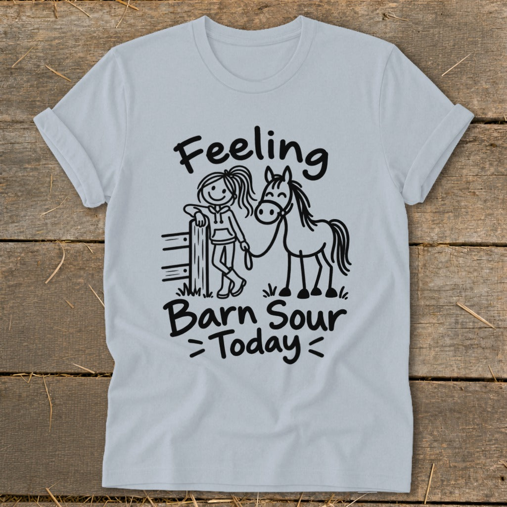 Light blue t-shirt with "Feeling Barn Sour Today" text and drawing of a girl with a horse.