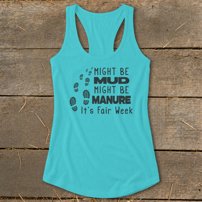 Turquoise tank top with "Might Be Mud Might Be Manure It's Fair Week" text and footprints.