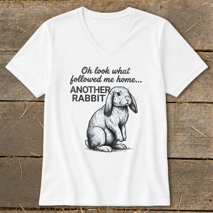White v-neck t-shirt with sketch of a lop-eared rabbit and text "Oh look what followed me home... ANOTHER RABBIT".