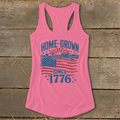 Pink tank top with "HOME GROWN SINCE 1776" text and American flag graphic.