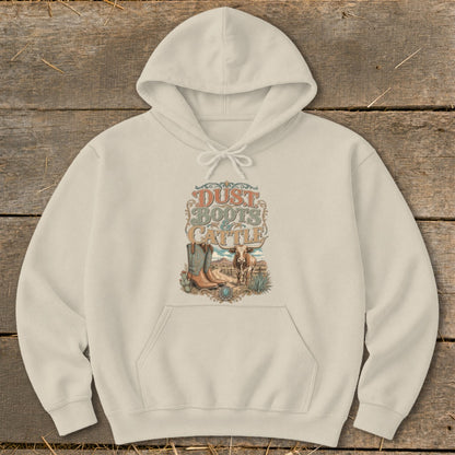Cream hoodie with "Dust Boots & Cattle" graphic featuring a cowboy boot, cattle, and western scene.