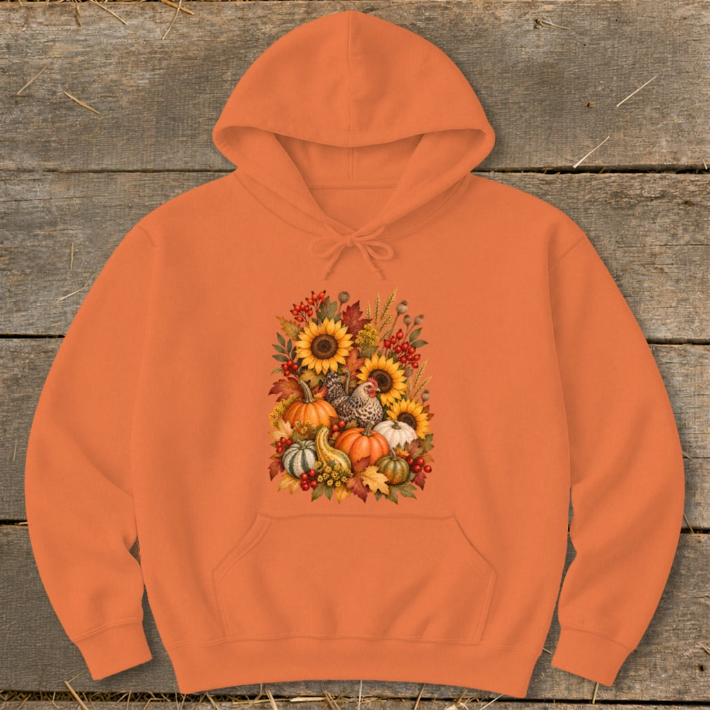 Orange hoodie with a fall harvest graphic featuring pumpkins, sunflowers, chickens, and gourds.
