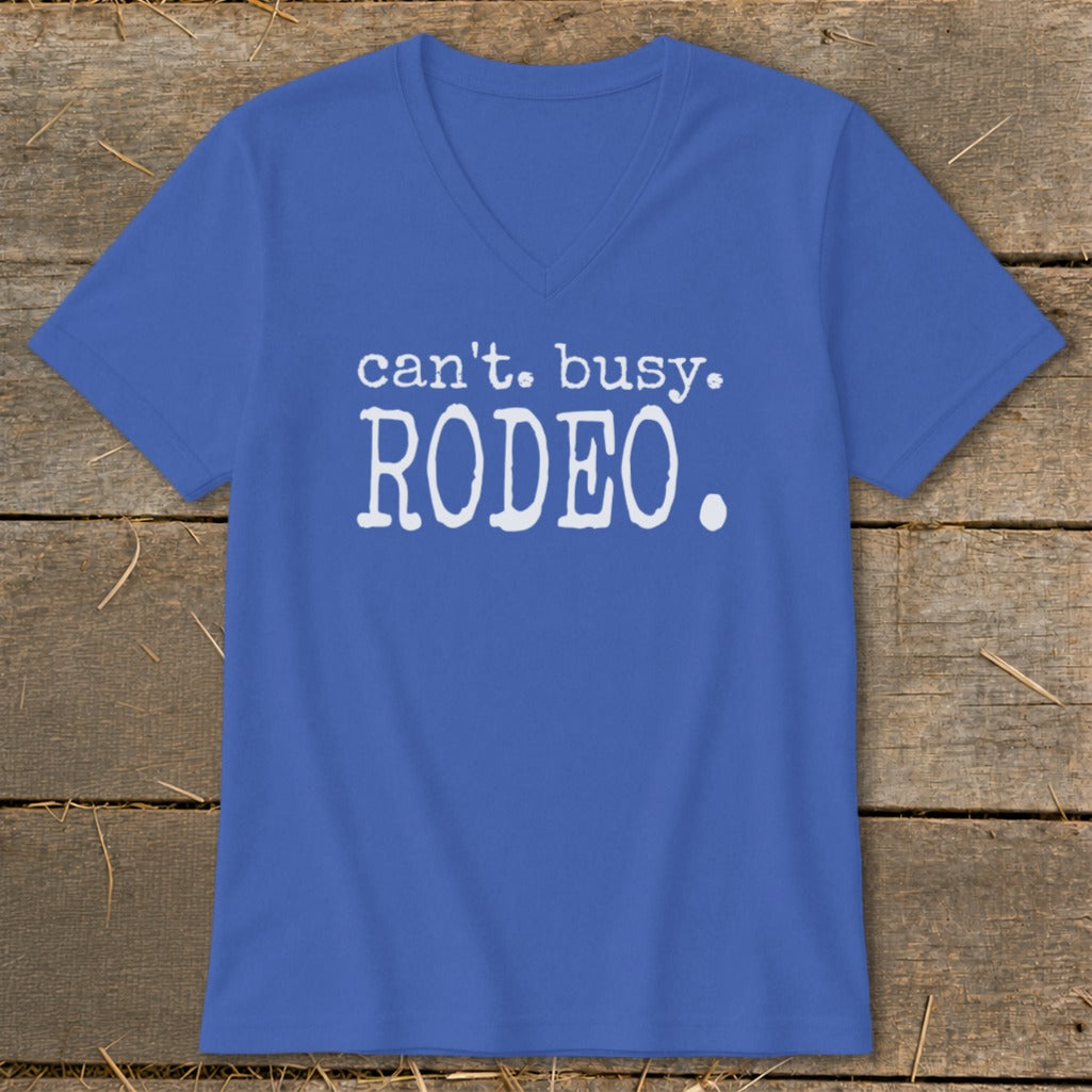 Blue v-neck t-shirt with white text "can't. busy. RODEO.".