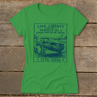 Green t-shirt with blue graphic: "Life, Liberty and the pursuit of a good nap in the truck 1776-2026".