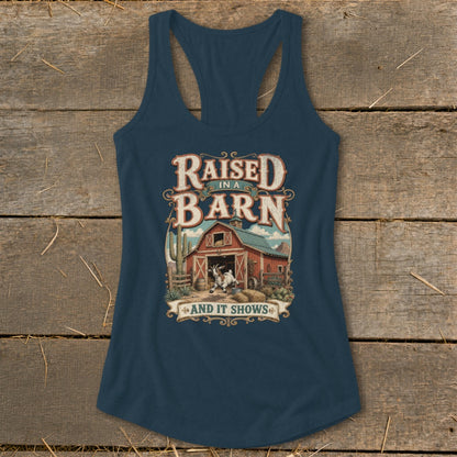 Dark blue tank top with "Raised in a Barn and it Shows" text and barn graphic.
