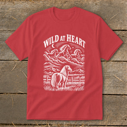 Red t-shirt with "Wild at Heart" graphic of horses in the sky and on the ground.