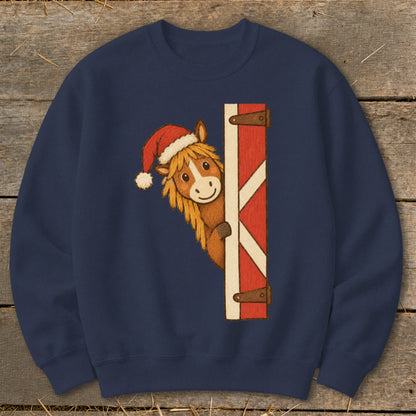 Illustration of a horse wearing a Santa hat peeking from behind a barn door.
