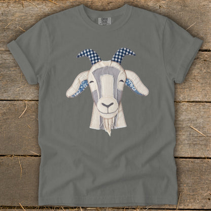 Grey t-shirt with a stitched applique goat face featuring gingham horns.