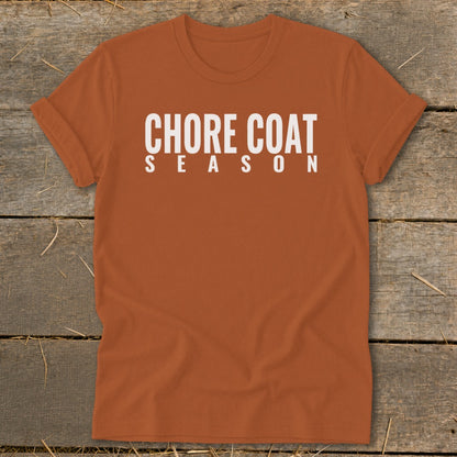 Orange t-shirt with "CHORE COAT SEASON" printed in white text.