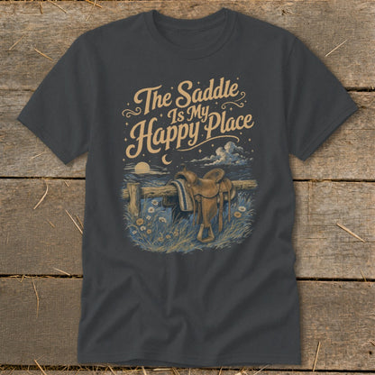 T-shirt graphic: "The Saddle Is My Happy Place" text above a saddle on a fence.