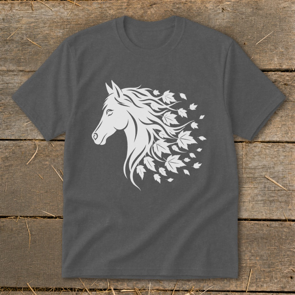 White horse head with flowing mane transitioning into autumn leaves on a dark grey t-shirt.