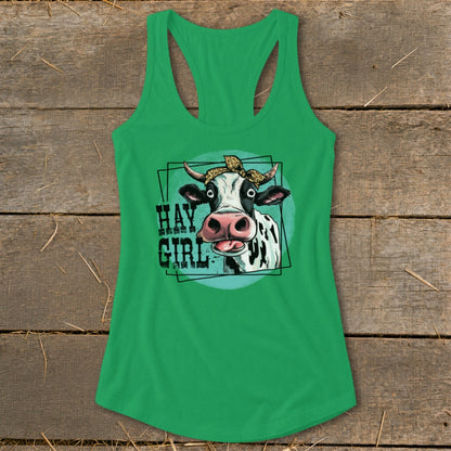 Green tank top with cartoon cow wearing a leopard print bandana and the text "Hay Girl".
