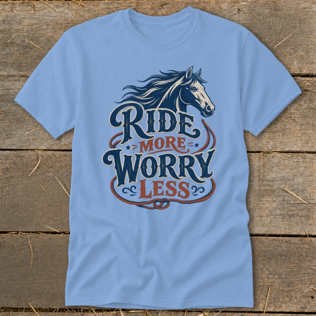 Light blue t-shirt with horse graphic and text "Ride More Worry Less."