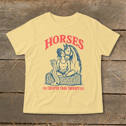 Yellow t-shirt with "HORSES Cheaper Than Therapy" graphic of a woman and horse.