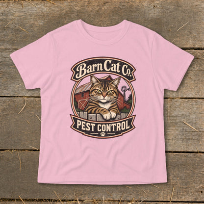 A light pink t-shirt featuring a circular graphic of a tabby cat behind a fence with the text Barn Cat Co Pest Control.
