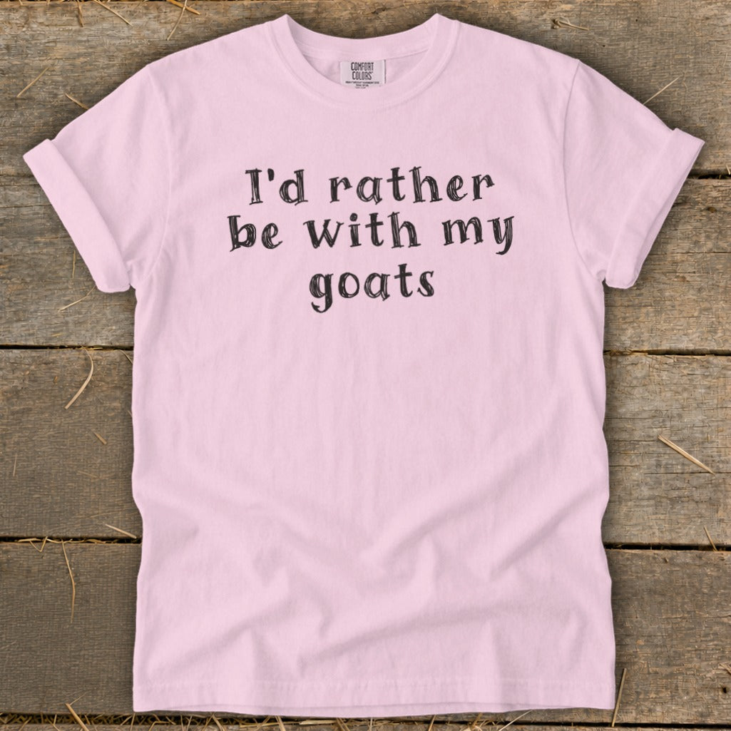 Pink t-shirt with "I'd rather be with my goats" text in black.