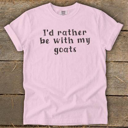 Pink t-shirt with "I'd rather be with my goats" text in black.