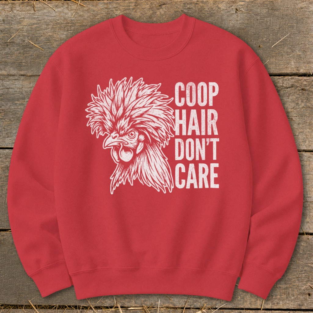 Red sweatshirt with white graphic of a fluffy chicken and text "COOP HAIR DON'T CARE".