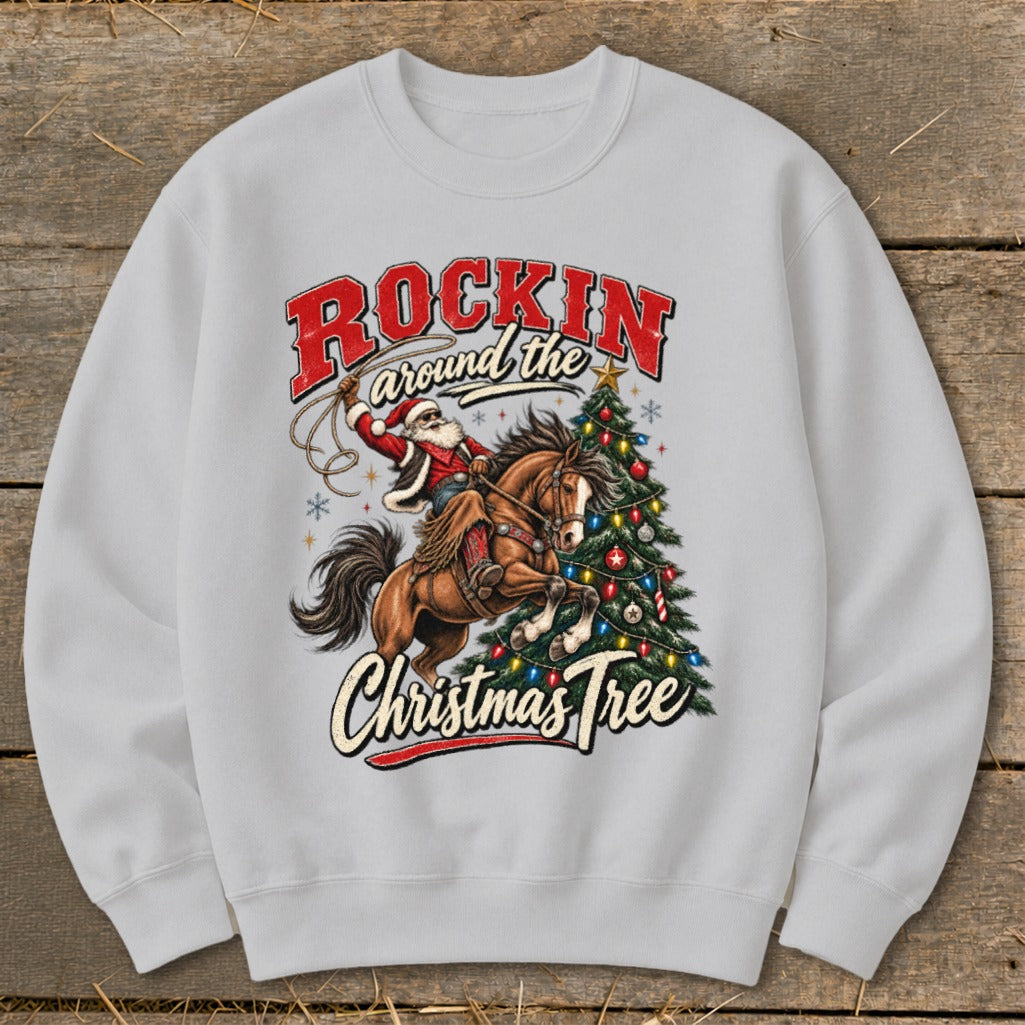 Santa on horseback lassoing a Christmas tree with "Rockin around the Christmas Tree" text.