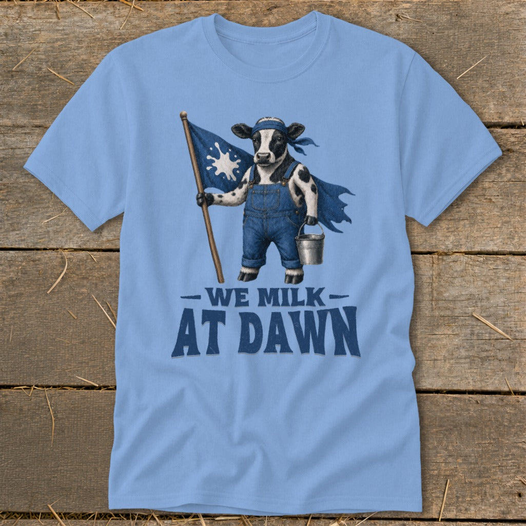 Cow in overalls holding flag and bucket, text "WE MILK AT DAWN"