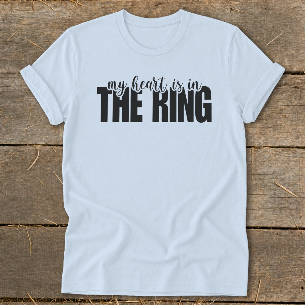 Light blue t-shirt with black text "my heart is in THE RING".