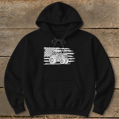 Black hoodie with white distressed tractor and American flag graphic.