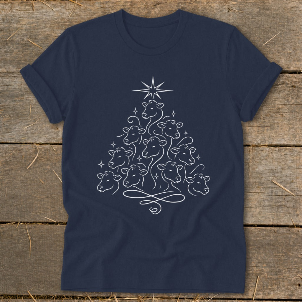 Dark navy t-shirt with white line art of a Christmas tree made of cows.
