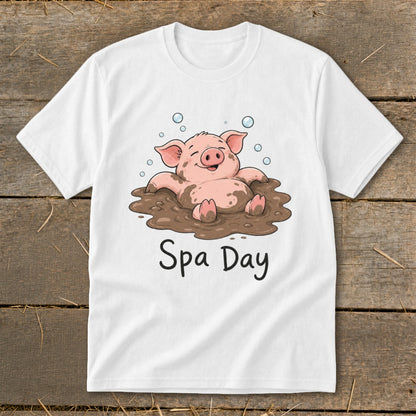 White t-shirt with cartoon pig in mud, text "Spa Day"