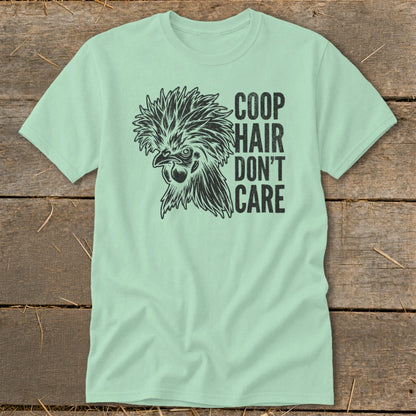 Light mint t-shirt with a black drawing of a chicken head and the text "COOP HAIR DON'T CARE".
