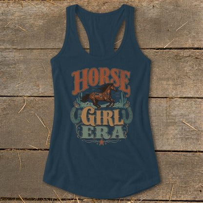 Blue racerback tank top with "Horse Girl Era" graphic and horse illustration.