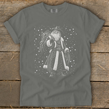 Cowboy Santa with sack of gifts and lasso on a grey t-shirt.