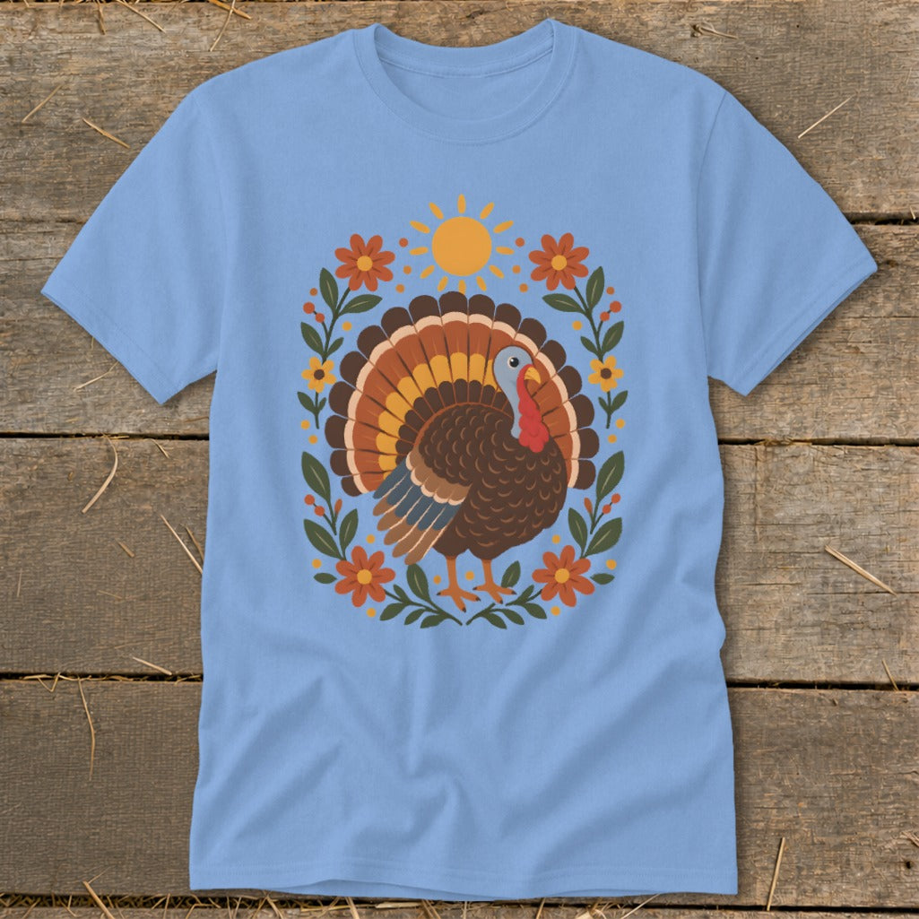 Light blue t-shirt with a stylized turkey and floral border design.