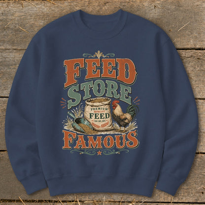 Crewneck sweatshirt with "Feed Store Famous" graphic featuring a rooster, bag of feed, and scoop.