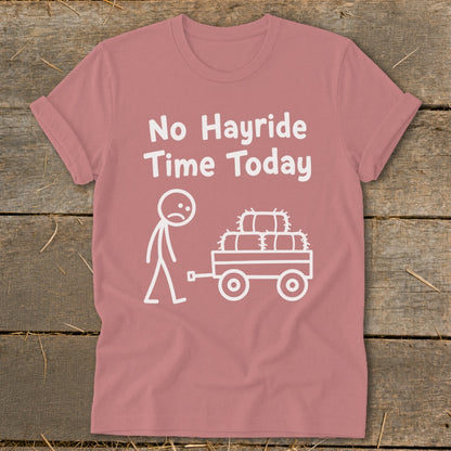 Pink t-shirt with "No Hayride Time Today" text and stick figure with hay wagon.