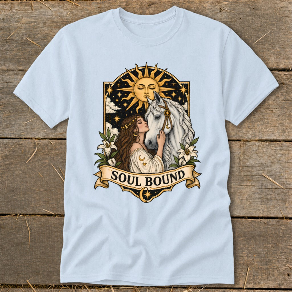 Light blue t-shirt with "Soul Bound" text featuring a woman and horse beneath a sun.