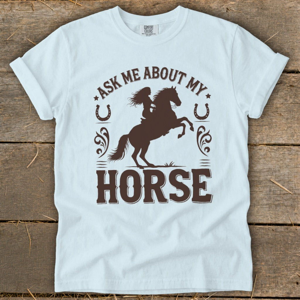 White t-shirt with "Ask Me About My Horse" and a silhouette of a woman riding a horse.